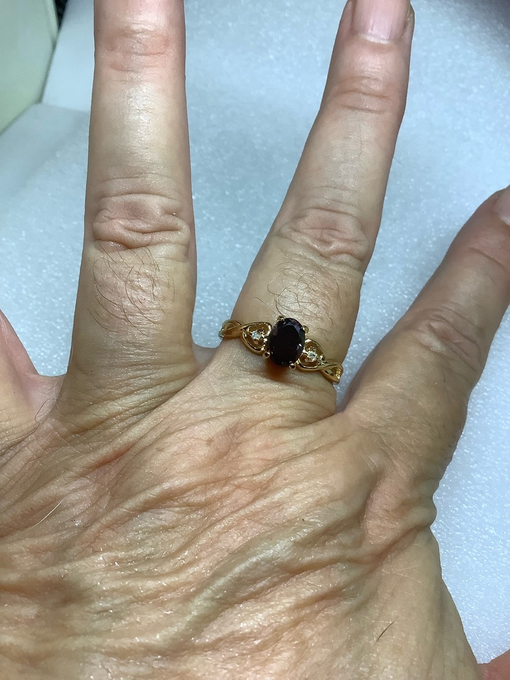 Gold Ring with Dark Red Oval Stone - Elegant Women's Jewelry